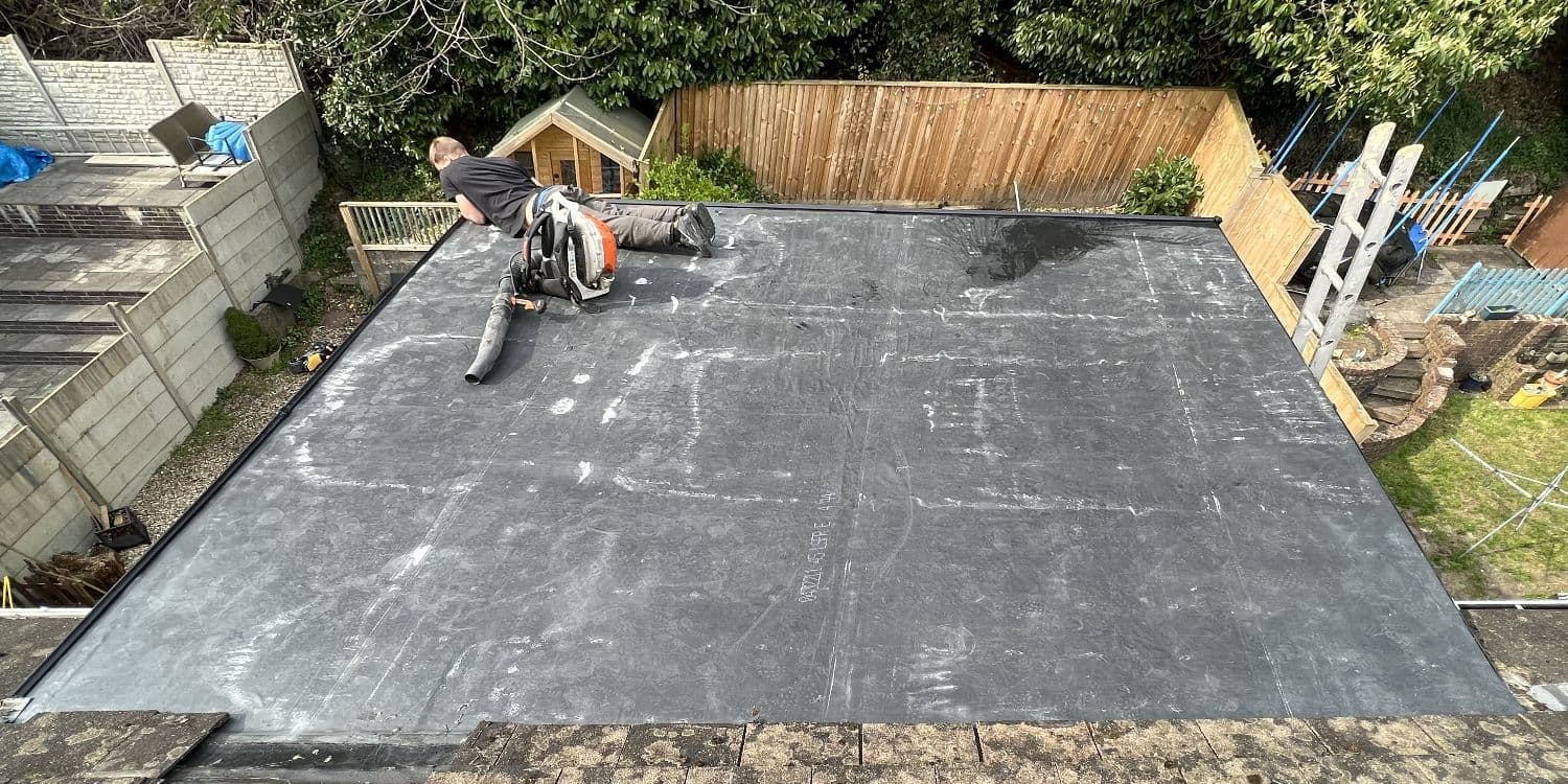 The same flat roof re-covered in rubber