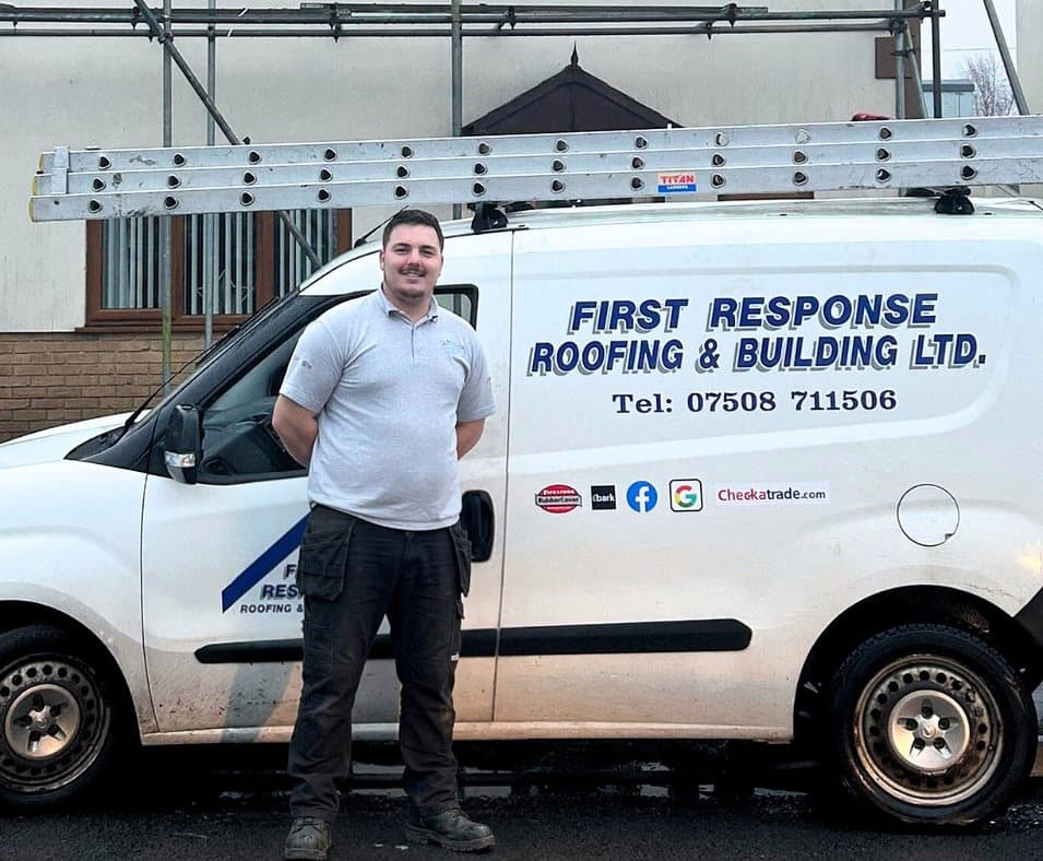 Sammy Lee standing in front of his First Response Roofing van