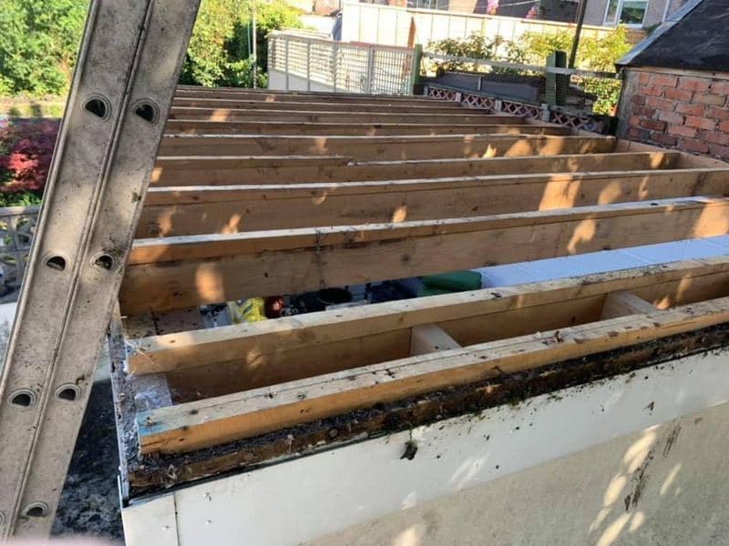Extension flat roof stripped back to the joists