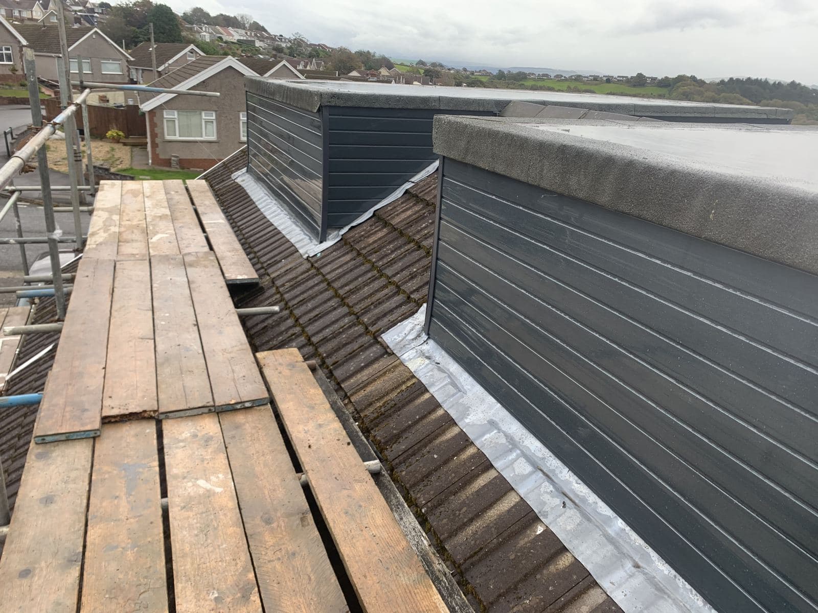 Dormer flashing on a tiled roof